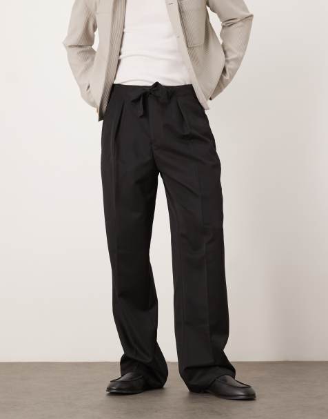 ASOS DESIGN – Elegante Hose in Schwarz mit weitem Bein, Bundfalten und Bindegürtel - view 1