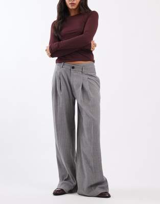 ASOS DESIGN - Elegante Hose mit niedrigem, asymmetrischem Bund, weitem Bein und schwarz-weißem Fischgrätmuster-Bunt