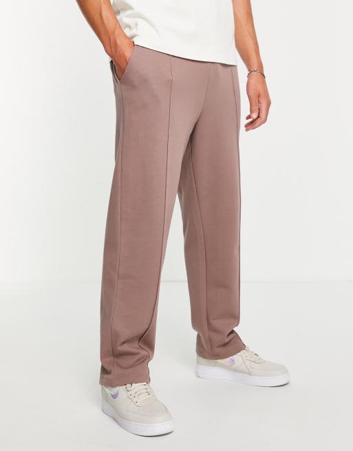 ASOS DESIGN – Elegante Jogginghose in verwaschenem Braun mit weitem Bein und Biesen