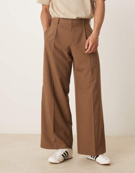 ASOS DESIGN – Elegante, locker geschnittene Hose in Braun mit Bundfalten vorne - view 1