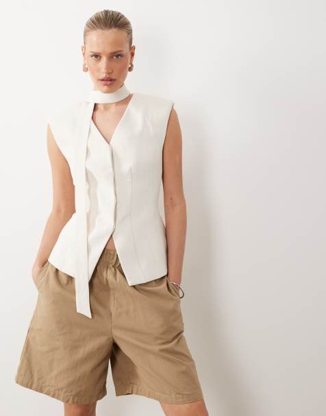 ASOS DESIGN – Elegante Longline-Weste in Cremeweiß mit geformter Hüftpartie und Schaldetail - view 1
