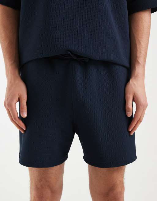 ASOS DESIGN – Elegante Oversize-Shorts aus strukturiertem Jersey in Marineblau, 3 von 5