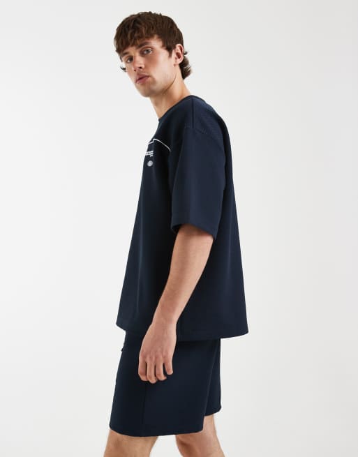 ASOS DESIGN – Elegante Oversize-Shorts aus strukturiertem Jersey in Marineblau, 4 von 5