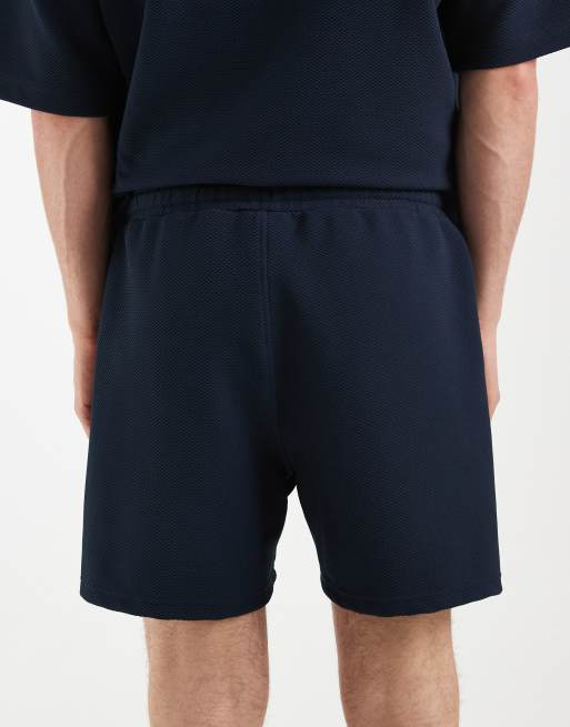 ASOS DESIGN – Elegante Oversize-Shorts aus strukturiertem Jersey in Marineblau, 5 von 5