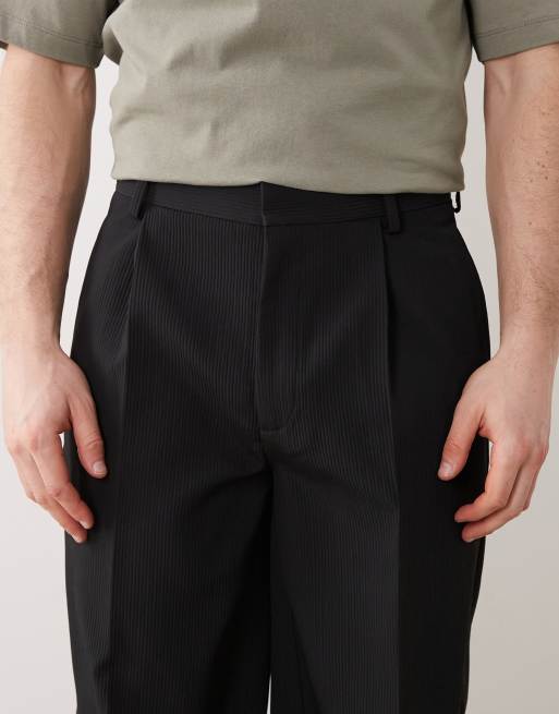 ASOS DESIGN - Elegante oversized toelopende comfortabele geribbelde broek in zwart, 5 van 5