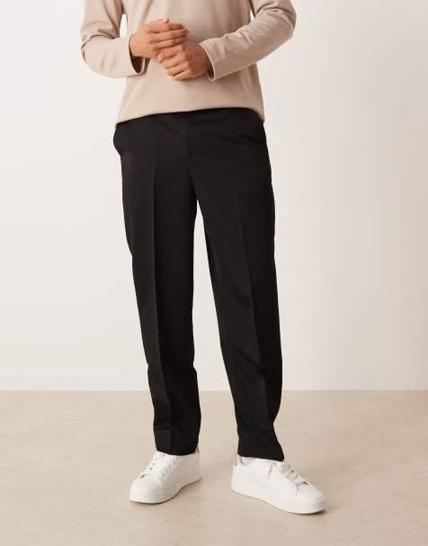 ASOS DESIGN - Elegante ruimvallende toelopende broek met kwart elastische tailleband in zwart - view 1