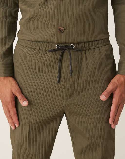 ASOS DESIGN – Elegante, schmal zulaufende Hose in Khaki mit Rippenstruktur und elastischem Bund, Kombiteil, 5 von 5