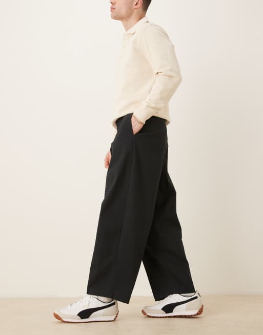 ASOS DESIGN – Elegante, schmal zulaufende Hose in Schwarz mit sehr weitem Schnitt, 2 von 5
