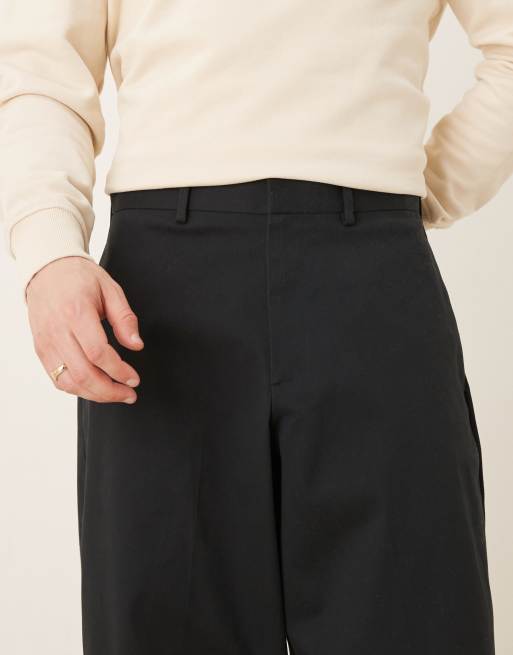 ASOS DESIGN – Elegante, schmal zulaufende Hose in Schwarz mit sehr weitem Schnitt, 4 von 5