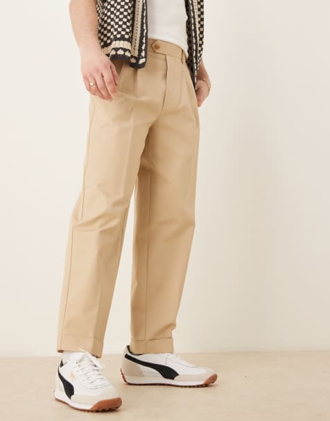 ASOS DESIGN – Elegante, schmal zulaufende Oversize-Chinohose aus Baumwolle in Steinbeige - view 1