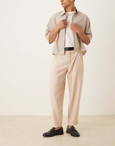 ASOS DESIGN – Elegante, schmal zulaufende Oversize-Hose in Beige - view 1