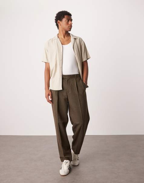 ASOS DESIGN – Elegante, schmal zulaufende Oversize-Hose in Braun aus Wollmix-Twill mit Bundfalte - view 1