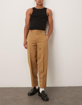 ASOS DESIGN – Elegante, schmal zulaufende Oversize-Hose in Kamelbraun - view 1
