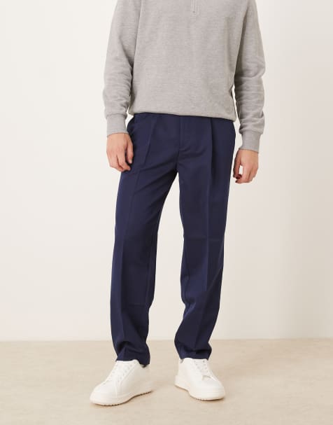 ASOS DESIGN – Elegante, schmal zulaufende Oversize-Hose in Marineblau - view 1