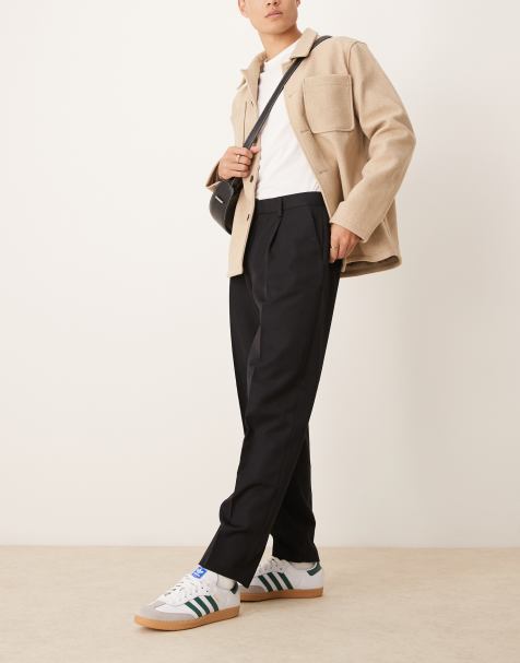 ASOS DESIGN – Elegante, schmal zulaufende Oversize-Hose in Schwarz mit Bundfalten - view 1
