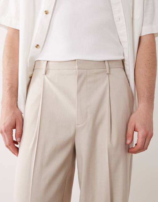 ASOS DESIGN – Elegante, schmal zulaufende Oversize-Hose in Steinbeige mit elastischem Bund, 2 von 5
