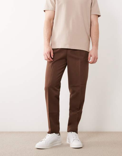 ASOS DESIGN – Elegante, schmal zulaufende Schlupfhose in Dunkelbraun, 3 von 5
