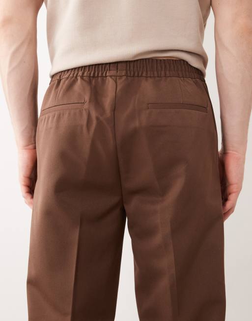 ASOS DESIGN – Elegante, schmal zulaufende Schlupfhose in Dunkelbraun, 4 von 5