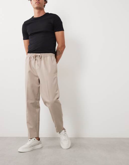 ASOS DESIGN – Elegante, schmal zulaufende Schlupfhose in Steinbeige, 2 von 5