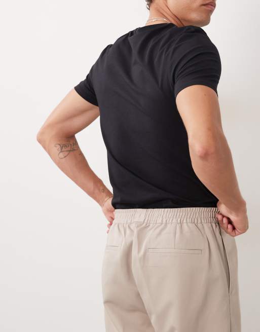 ASOS DESIGN – Elegante, schmal zulaufende Schlupfhose in Steinbeige, 5 von 5