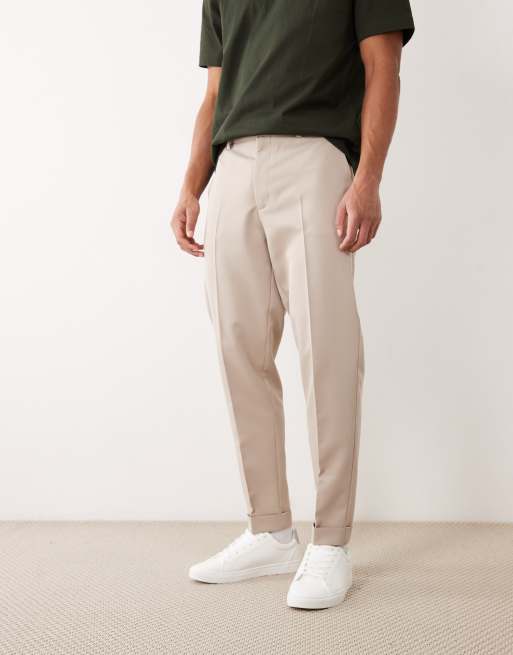 ASOS DESIGN - Elegante toelopende broek met elastische taille en omslag in stone, 2 van 5