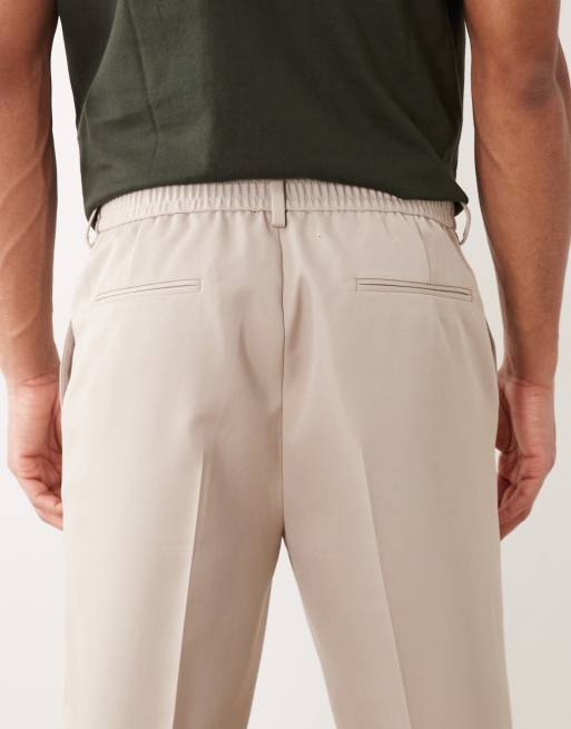 ASOS DESIGN - Elegante toelopende broek met elastische taille en omslag in stone, 5 van 5