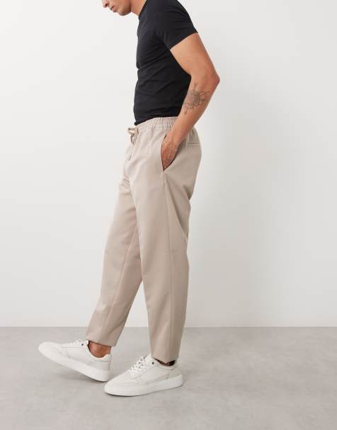 ASOS DESIGN - Elegante toelopende broek met elastische taille in stone - view 1