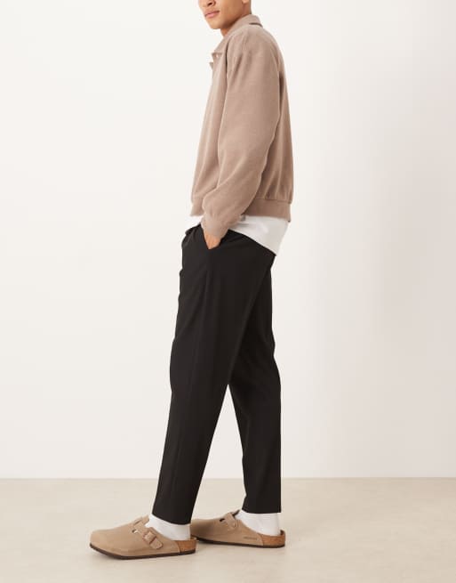 ASOS DESIGN - Elegante toelopende pantalon met elastische tailleband in zwart, 3 van 5