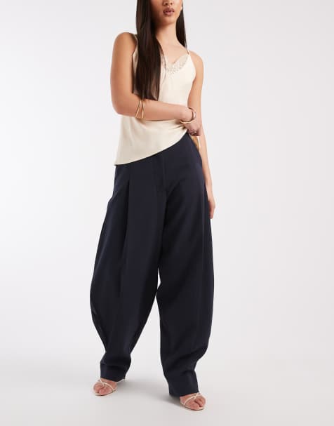 ASOS DESIGN – Elegante, voluminöse Ballonhose in Marineblau mit seitlichen Falten - view 1