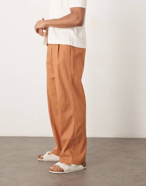 ASOS DESIGN – Elegante, weit geschnittene Hose aus Leinenmix in Rostrot mit doppelten Bundfalten - view 1