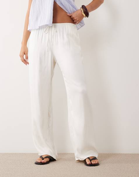 ASOS DESIGN - Elfenbensfarvede pull-on-bukser i satin med vide ben - view 1