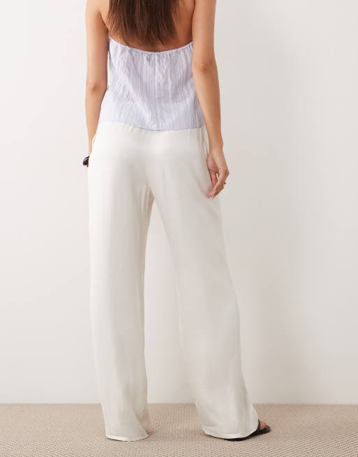 ASOS DESIGN - Elfenbensfarvede pull-on-bukser i satin med vide ben, 4 af 5