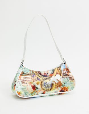 ASOS DESIGN 90s shoulder bag in monogram print with hardware clip