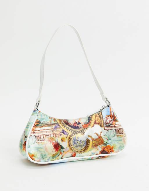 ASOS DESIGN 90s shoulder bag in monogram print with hardware clip