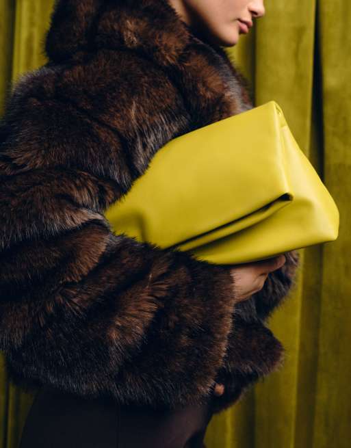 ASOS DESIGN elongated clutch bag in chartreuse