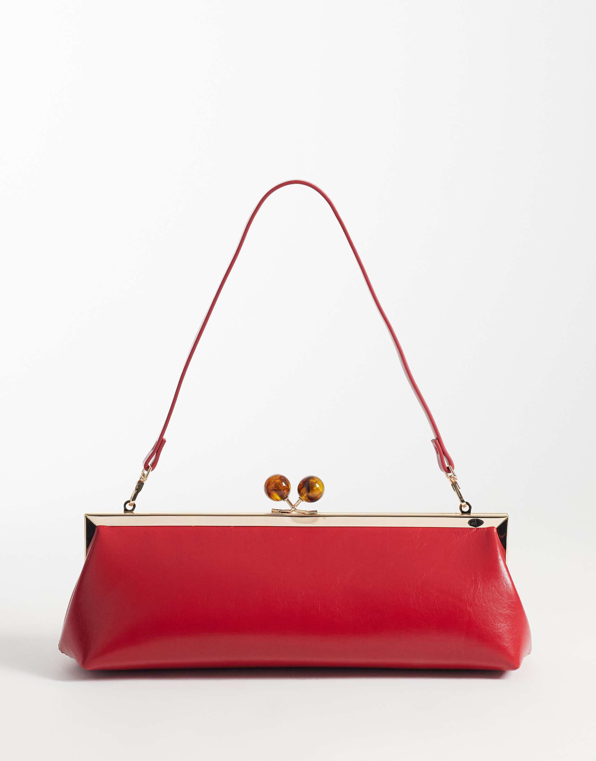 asos design elongated frame clutch bag with shoulder strap in red
