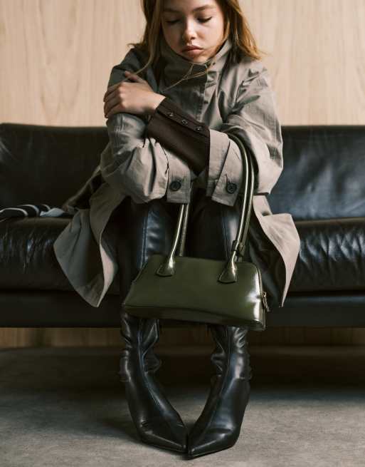 ASOS DESIGN elongated handle curved base bowler bag with seam details in olive