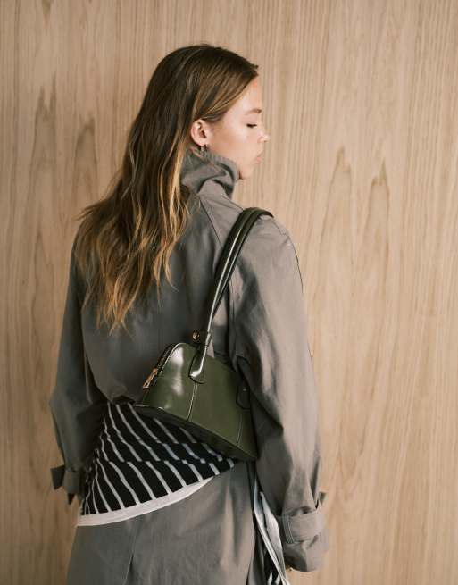 ASOS DESIGN elongated handle curved base bowler bag with seam details in olive