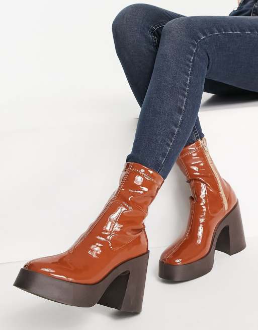asos design elsie high heeled sock boots in bone patent