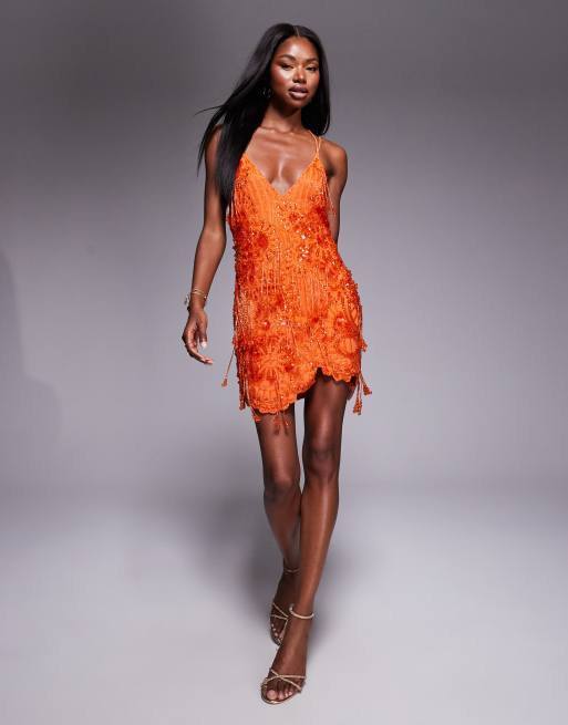ASOS DESIGN embellished asymmetric mini with tie straps in bright orange