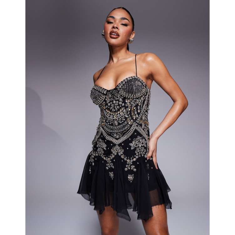 ASOS DESIGN embellished camisole mini dress with flippy hem in black | ASOS
