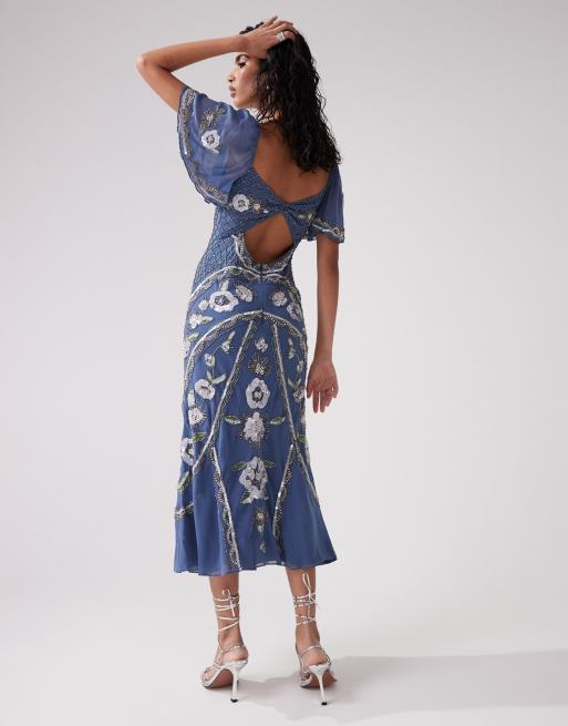 ASOS DESIGN flutter sleeve maxi dress with trailing floral embellishment in  blue