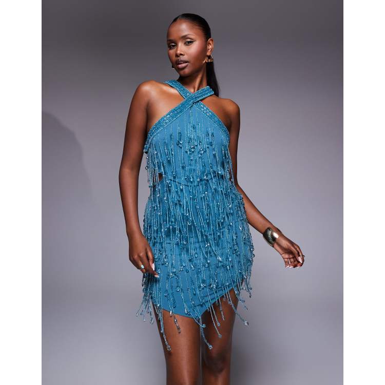 ASOS DESIGN embellished halter mini dress with cut-out waist and pointed  hem in blue | ASOS