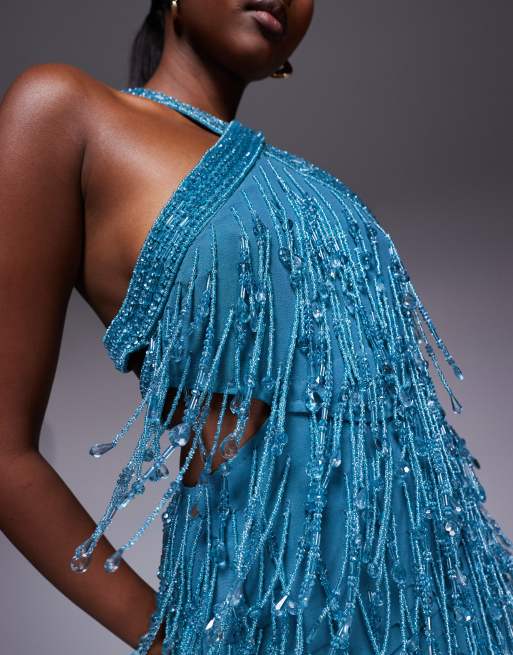 ASOS DESIGN embellished halter mini dress with cut-out waist and pointed hem in blue
