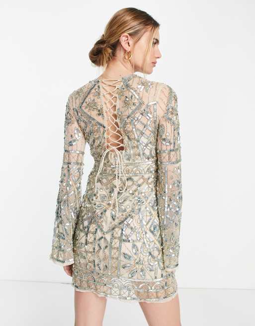 wildest dreams flare sleeve mini dress in cream ASOS DESIGN embellished mini dress with flared sleeve and tie back in cream