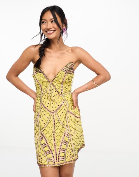 ASOS DESIGN embellished structured plunge mini dress with curve hem in yellow - view 1