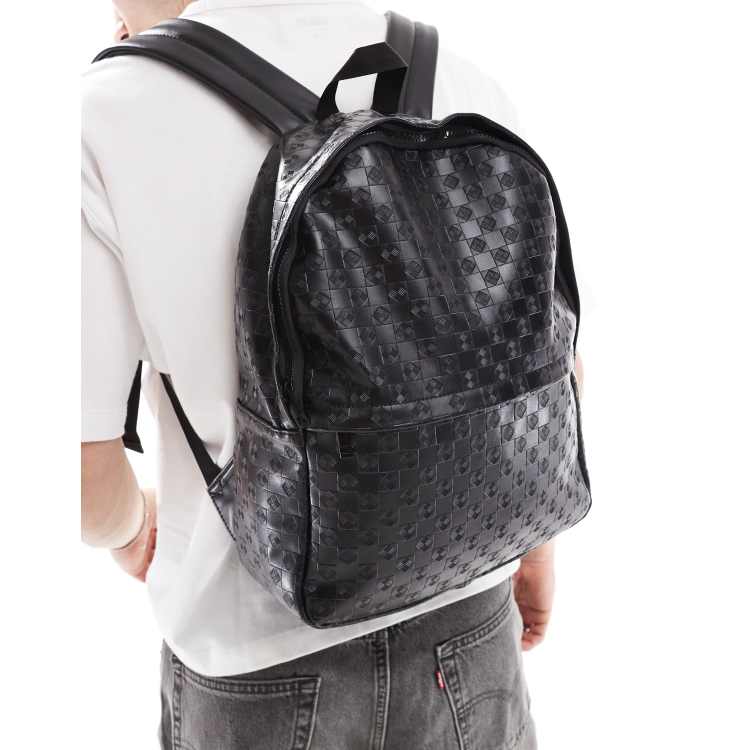 asos leather embossed backpack ASOS DESIGN embossed backpack in black