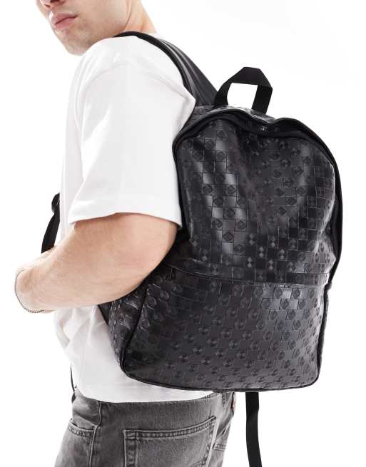 asos leather embossed backpack ASOS DESIGN embossed backpack in black