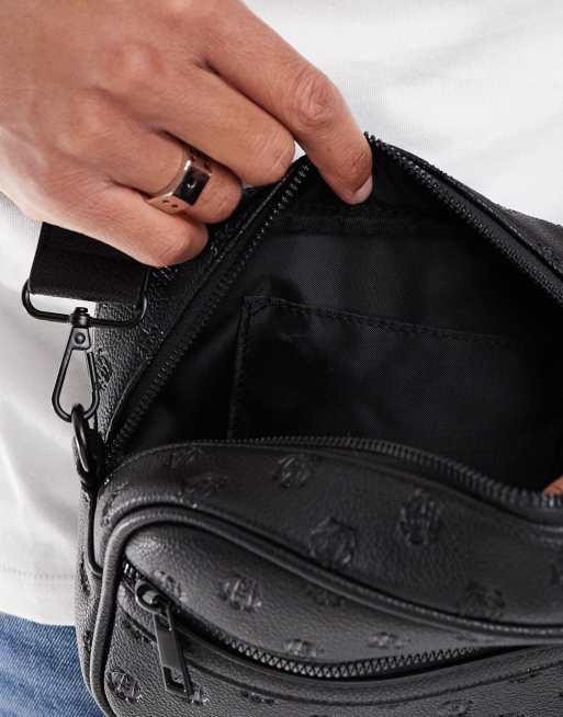 ASOS DESIGN embossed faux leather crossbody bag in black