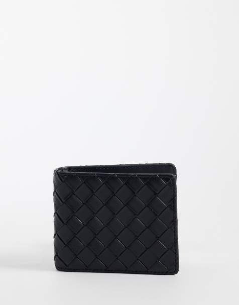 ASOS DESIGN embossed faux leather wallet in black - view 1